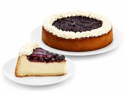 Pay de queso con mora de Pastelerías Marisa, postre artesanal con relleno cremoso de queso y cobertura de mora.