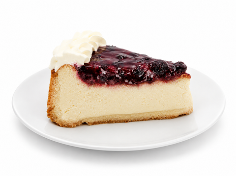 Pay de queso con mora de Pastelerías Marisa, postre artesanal con relleno cremoso de queso y cobertura de mora.