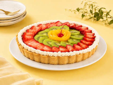 Pay de queso con frutas de Pastelerías Marisa, postre artesanal con relleno cremoso de queso y frutas frescas.