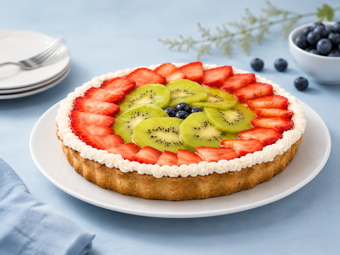 Pay de queso con frutas sin azúcar de Pastelerías Marisa, postre artesanal con relleno cremoso de queso y frutas frescas, elaborado sin azúcar añadida.